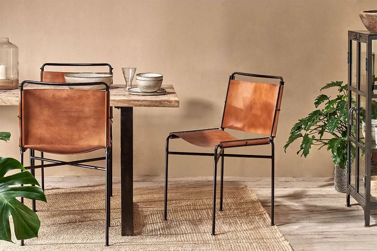 Nkuku New Arrivals Nirmi Leather Sling Back Dining Chair 3 Nkuku New Arrivals Nirmi Leather Sling Back Dining Chair