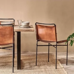 Nkuku New Arrivals Nirmi Leather Sling Back Dining Chair