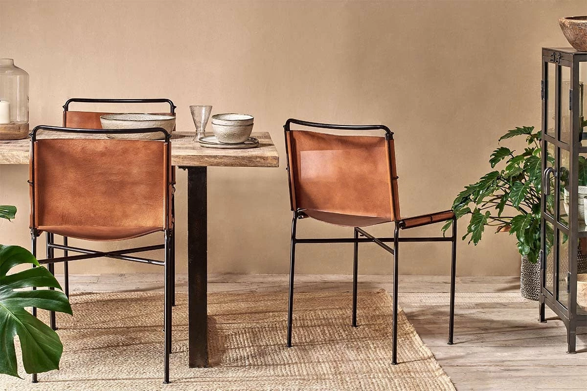 Nkuku New Arrivals Nirmi Leather Sling Back Dining Chair 4 Nkuku New Arrivals Nirmi Leather Sling Back Dining Chair