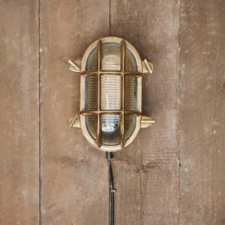 Nkuku Oshi Brass Oval Outdoor Bulkhead Light - Brass Outdoor Lighting